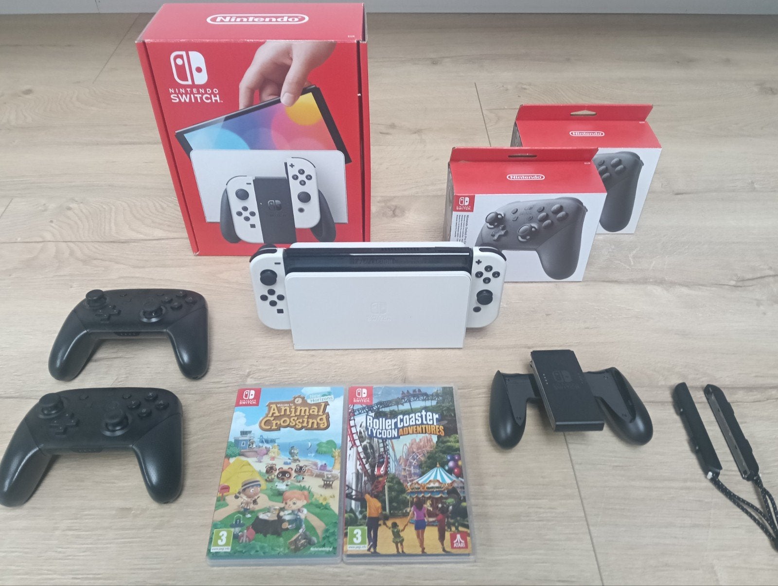 Nintendo Switch OLED, Met games, Met 2 controllers, Zo goed als nieuw, Switch OLED