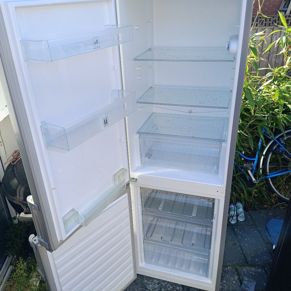 Whirlpool koelvriescombinatie (RVS) – Werkt uitstekend!, Huis en Inrichting, Ophalen of Verzenden