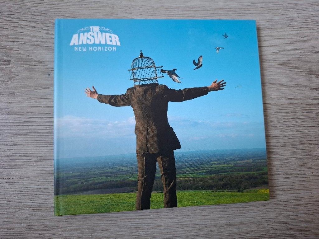 Cd The Answer  – New Horizon. (2013), Rock, Ophalen of Verzenden, Zo goed als nieuw, Inclusief boekje