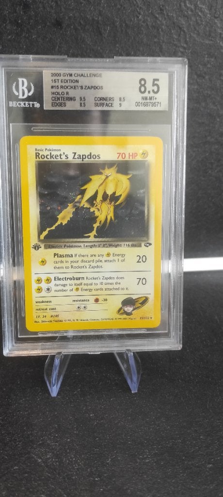 Rocket's Zapdos 1st edition BGS 8.5, Ophalen of Verzenden, Zo goed als nieuw, Losse kaart, Foil