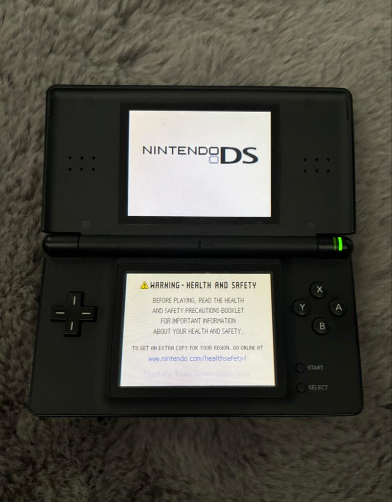 Nintendo DS Lite Zwart met 4 games en oplader, Met games, Zwart, Ophalen of Verzenden, Zo goed als nieuw