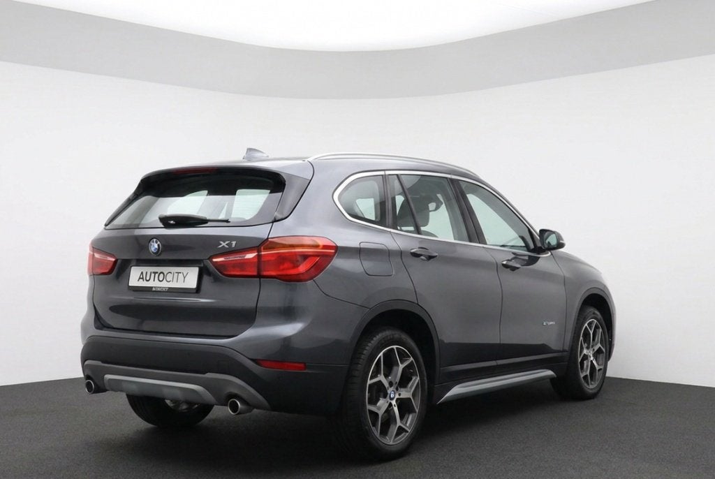 BMW X1 sDrive20i Orange Edition 192PK Panorama dak | Leder |, Auto's, 1998 cc, Bedrijf, SUV of Terreinwagen, 84 €/maand