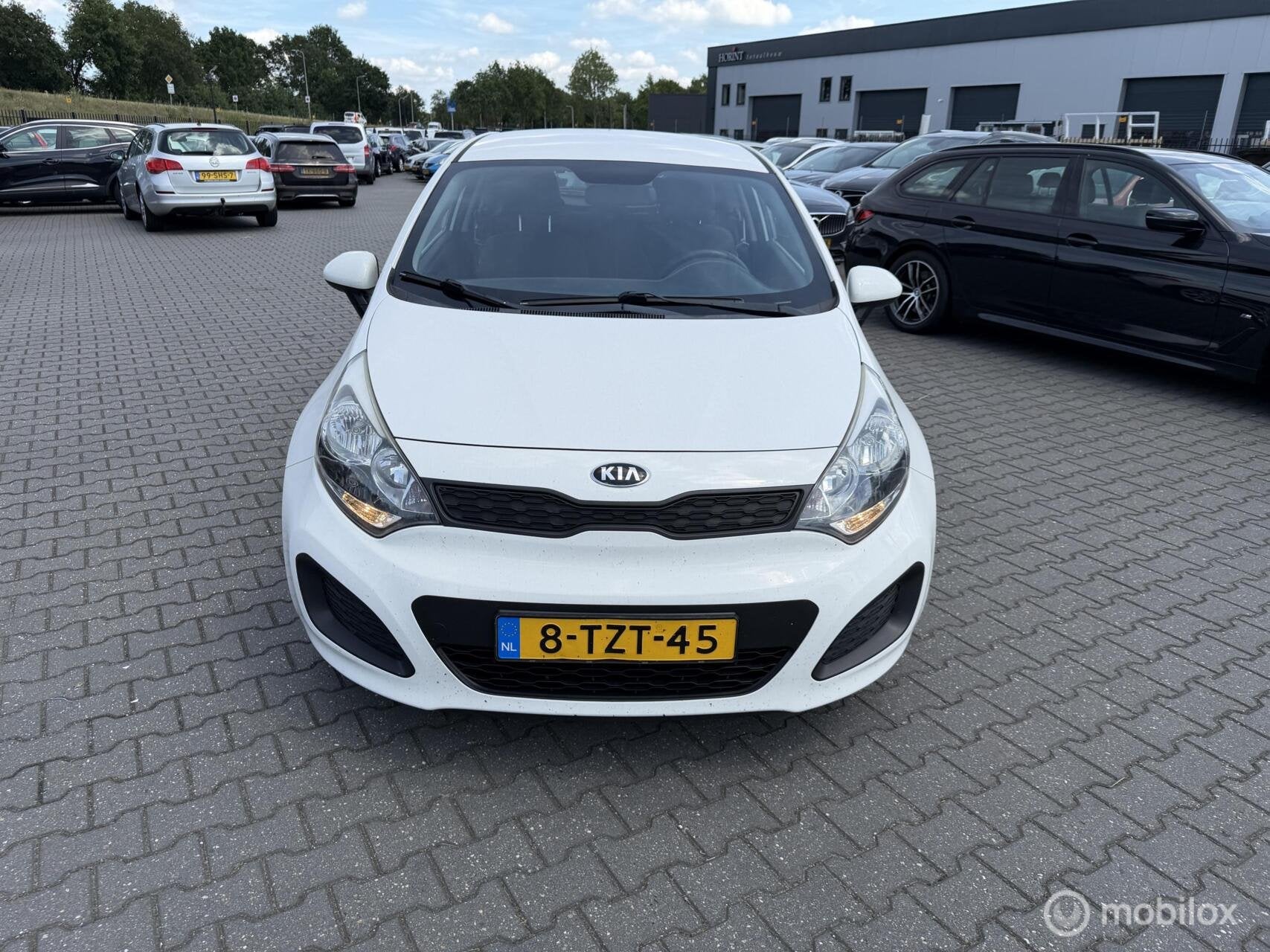Kia Rio 1.2 CVVT ComfortLine erco, Euro 5, Zwart, 4 cilinders, Wit