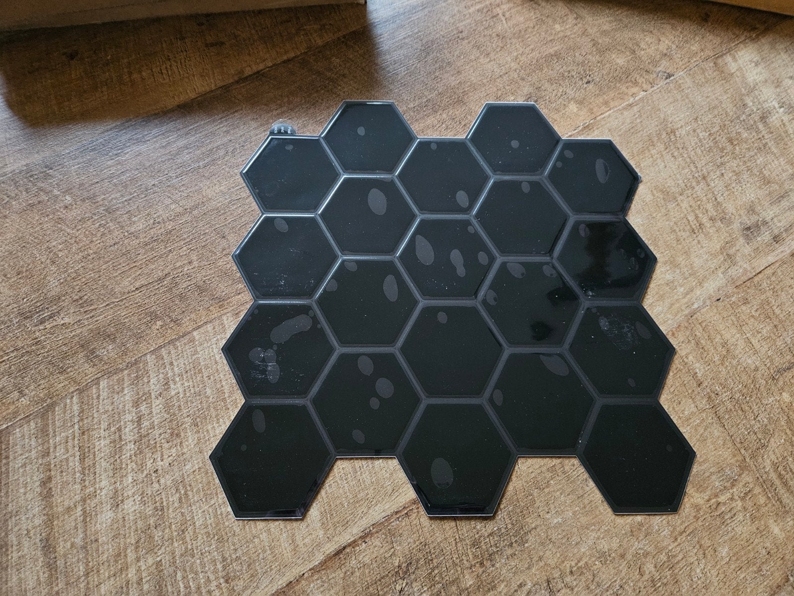 Zelfklevende tegels / steenstrips - Zwart hexagon, Ophalen