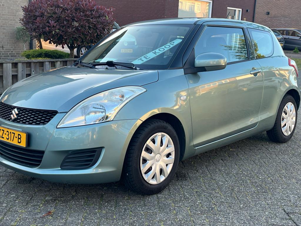 Suzuki Swift 1.2 3-D 2011 Grijs, nwe koppl +Versnellingsb, Voorwielaandrijving, Stof, Swift, Handgeschakeld