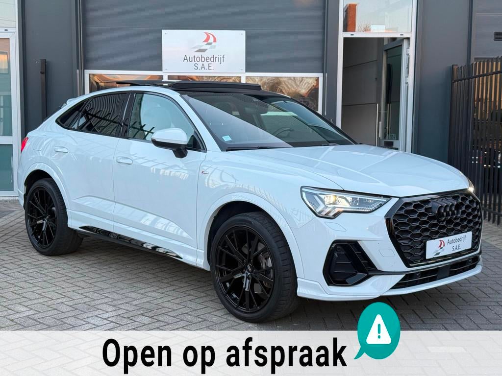 Audi Q3 Sportback 45 TFSI e 3x S-Line MATRIX PANO SFEER TREK, Auto's, Gebruikt, Euro 6, Leder en Stof, Wit