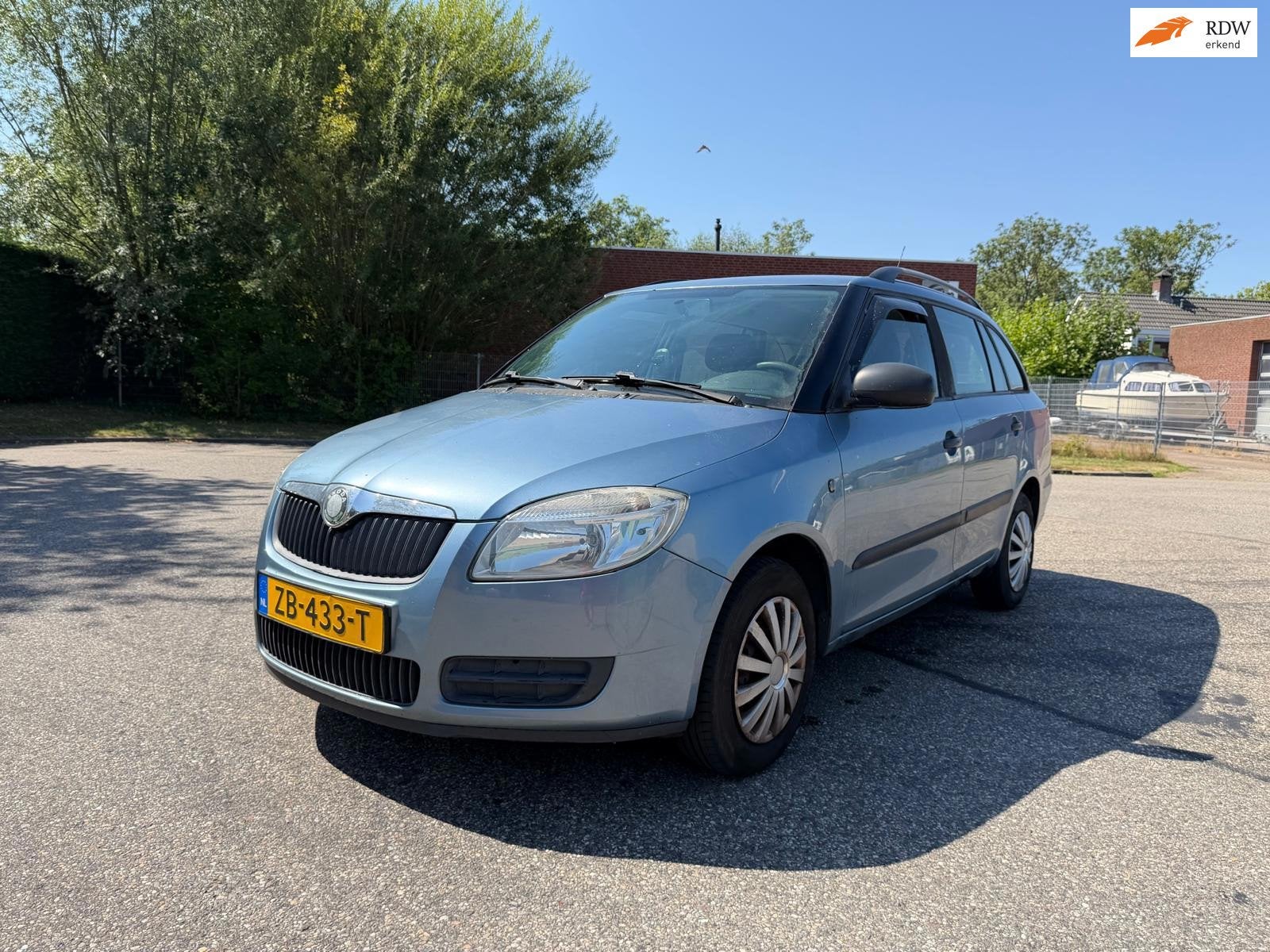 Skoda Fabia Combi 1.2-12V Ambition Business Line Achteruit c, Voorwielaandrijving, 450 kg, Blauw, 1198 cc