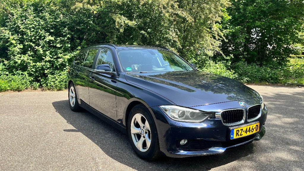 BMW 3-Serie 2.0 320D EDE Touring 2013 Blauw F31, Auto's, BMW, Euro 5, Achterwielaandrijving, 1995 cc, Zwart