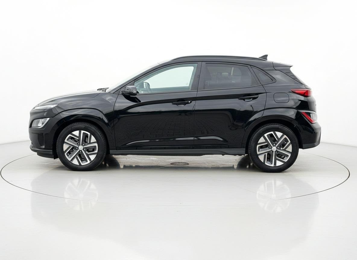 Hyundai Kona EV Fashion 64 kWh ADAPT.CRUISE HEADUP.DISPL CAM, Stof, Zwart, Origineel Nederlands, 410 min