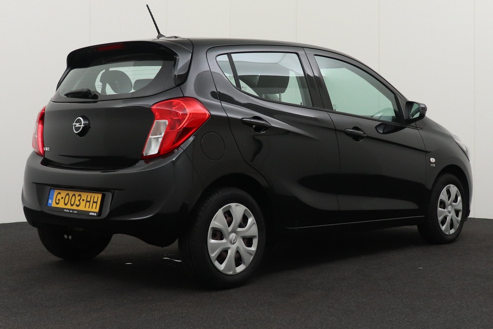 Opel KARL 1.0 120 Jaar Edition Airco Bluetooth Cruise, Stof, Gebruikt, Zwart, Origineel Nederlands