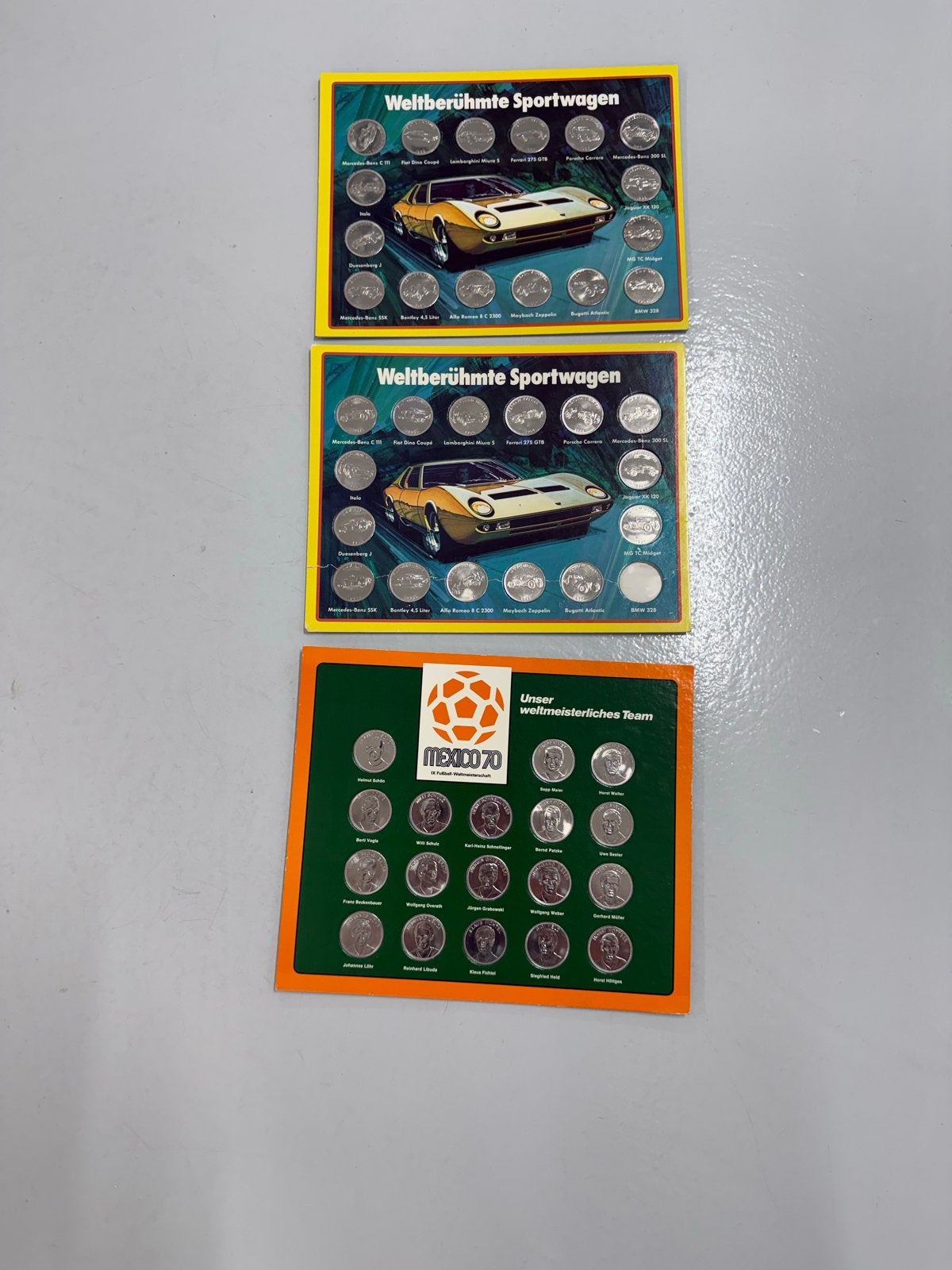 Verzamelmappen met munten: Sportwagens & Mexico 70, Ophalen of Verzenden, Verzamelmap