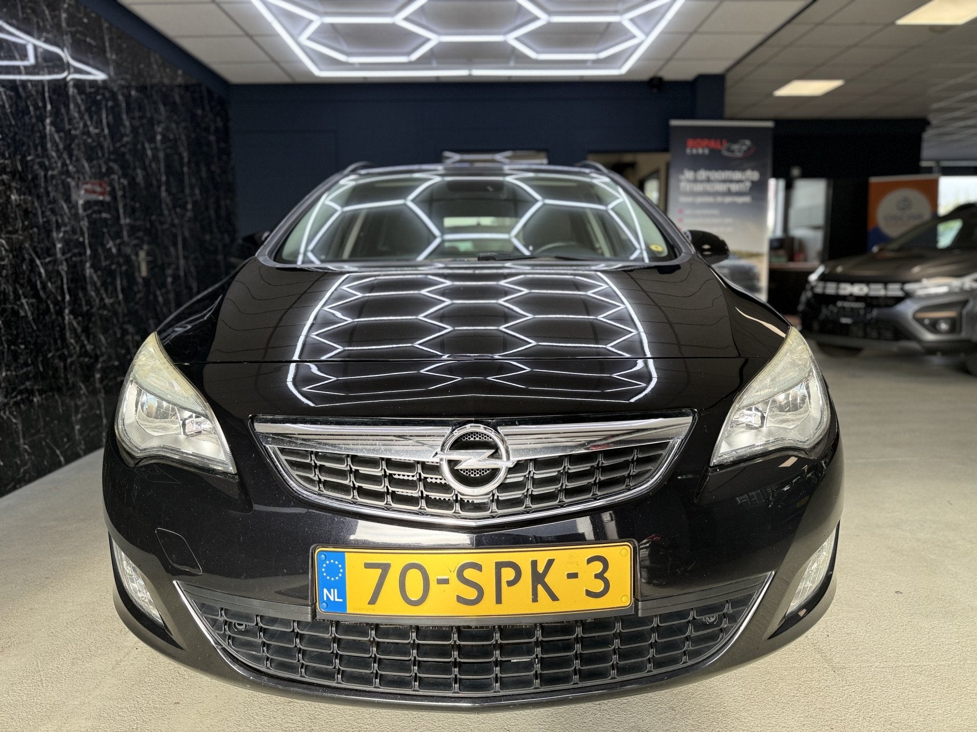 Opel Astra Sports Tourer 1.4 Turbo Edition (bj 2011), Auto's, Voorwielaandrijving, Euro 5, Stof, Gebruikt