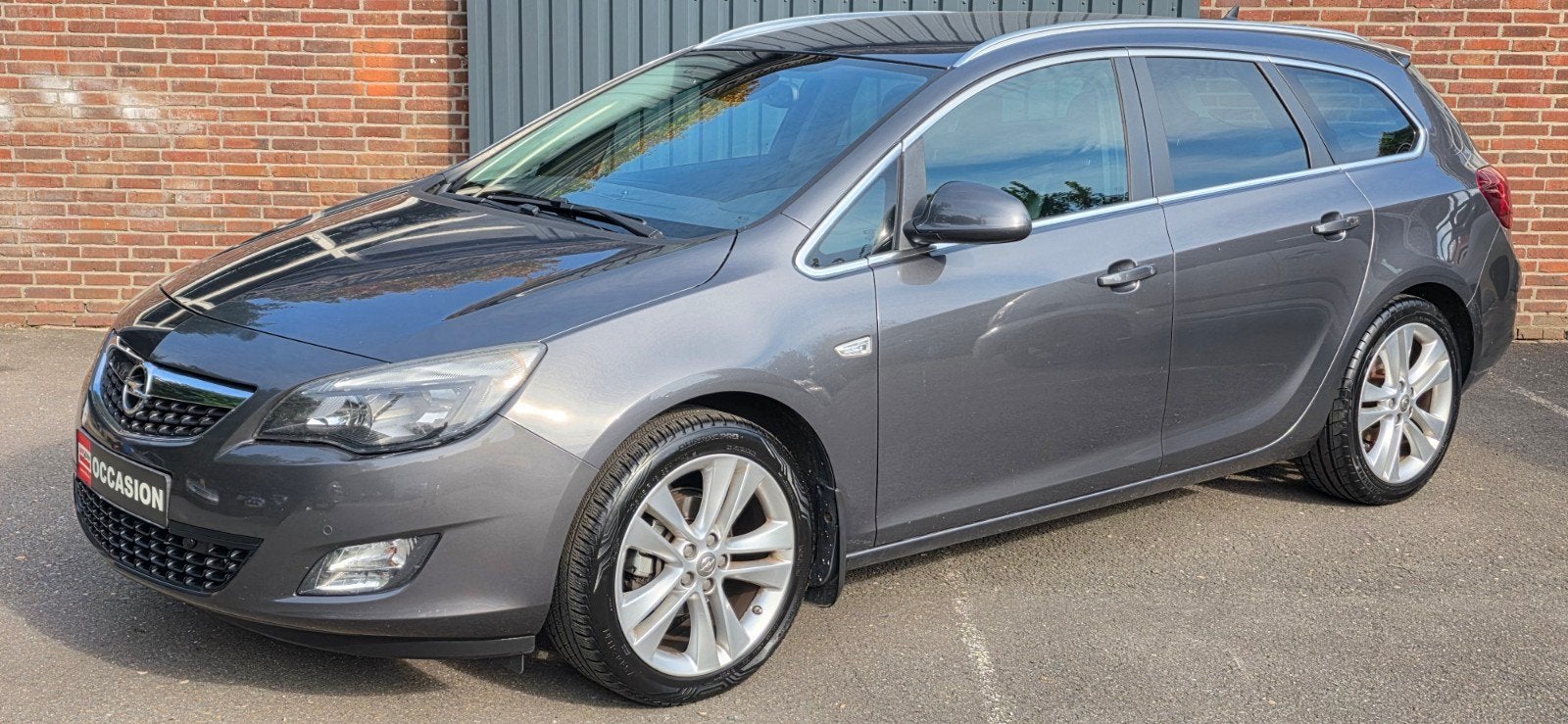 Opel Astra 1.4 Turbo 103KW ST 2011 Grijs, Auto's, Voorwielaandrijving, 4 cilinders, 1337 kg, Origineel Nederlands