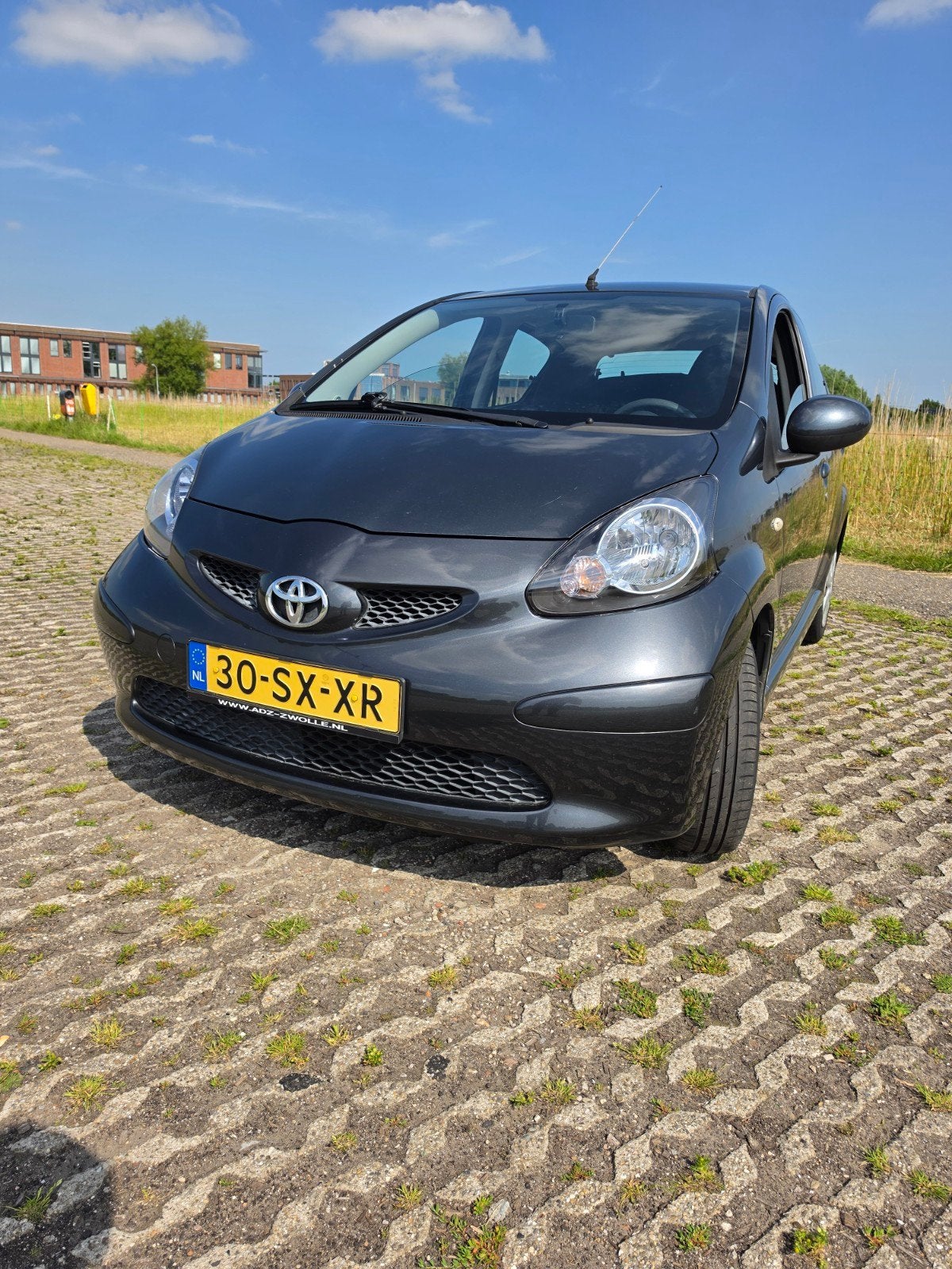 Toyota Aygo 1.0 12V Vvt-i 5DRS 2006 Grijs, Auto's, Toyota, Voorwielaandrijving, Stof, Zwart, 4 stoelen