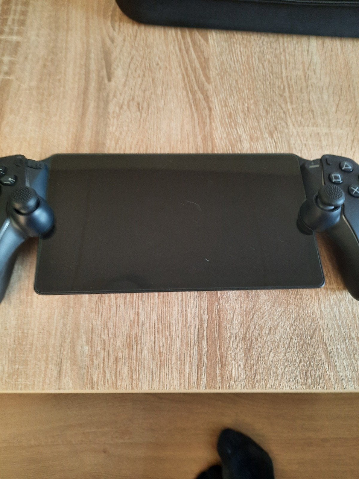 PlayStation Vita met controller grip en bescherm hoes, Spelcomputers en Games, Ophalen, Nieuw, Zwart