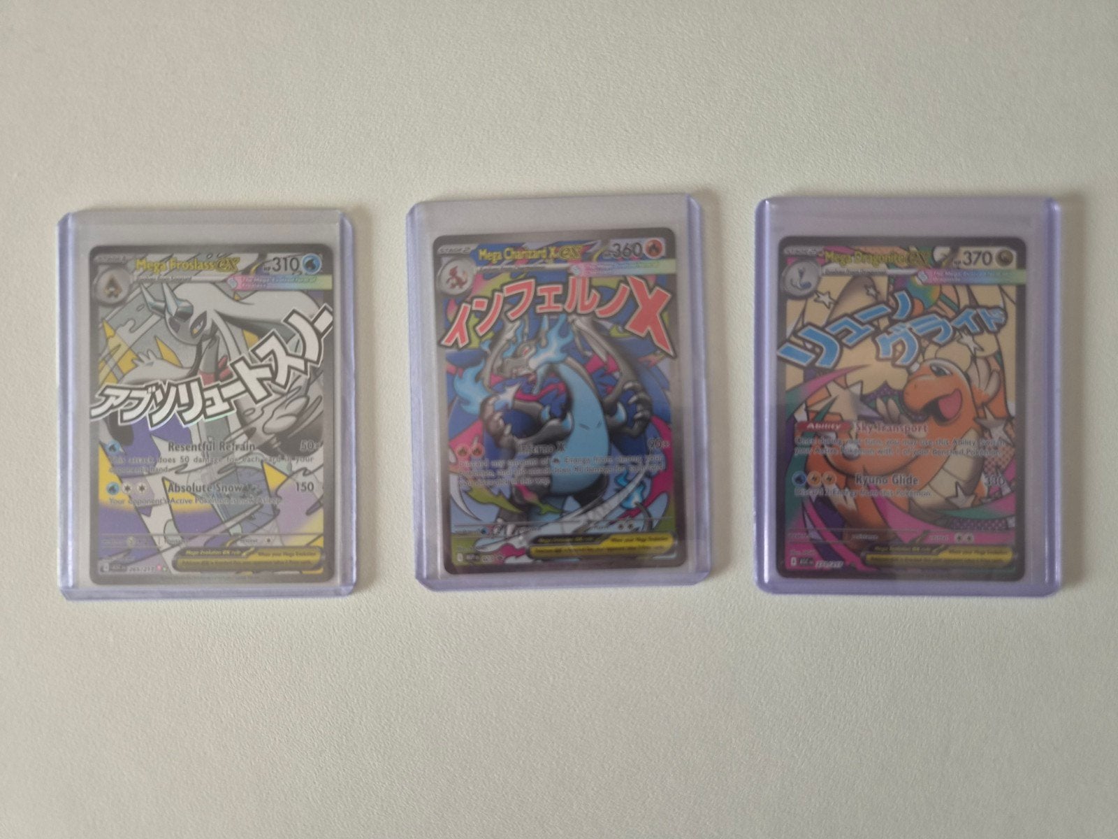 Pokémon kaarten - Froslass, Charizard en Dragonite Attack R, Ophalen of Verzenden, Zo goed als nieuw, Meerdere kaarten, Foil