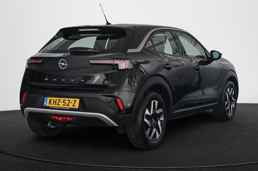 Opel Mokka-e Elegance 50-kWh 11kw bl. Apple CarPlay Achterui, Auto's, Opel, Gebruikt, Parkeersensor, 338 km, 315 min