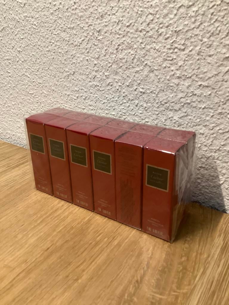 Cartier parfum pasha noir absolu 12 x 2ml, Ophalen of Verzenden, Nieuw