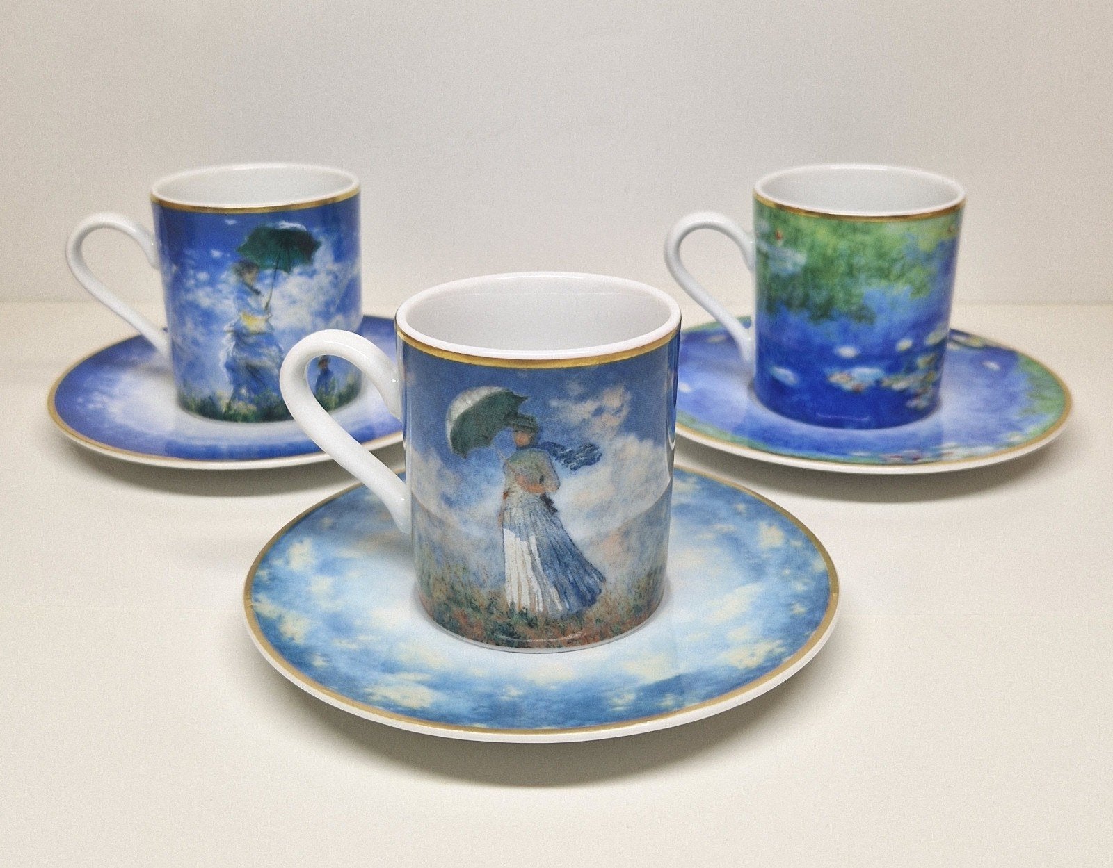 Goebel Artis Orbis Claude Monet koffieset voor drie., Ophalen of Verzenden, Zo goed als nieuw, Overige stijlen, Kop(pen) en/of Schotel(s)