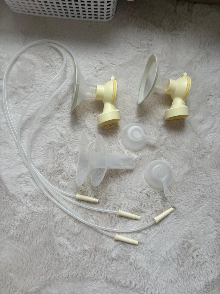 Medela symphony dubbele afkolfset amper gebruikt (24 en 27), Ophalen, Zo goed als nieuw, Accessoires