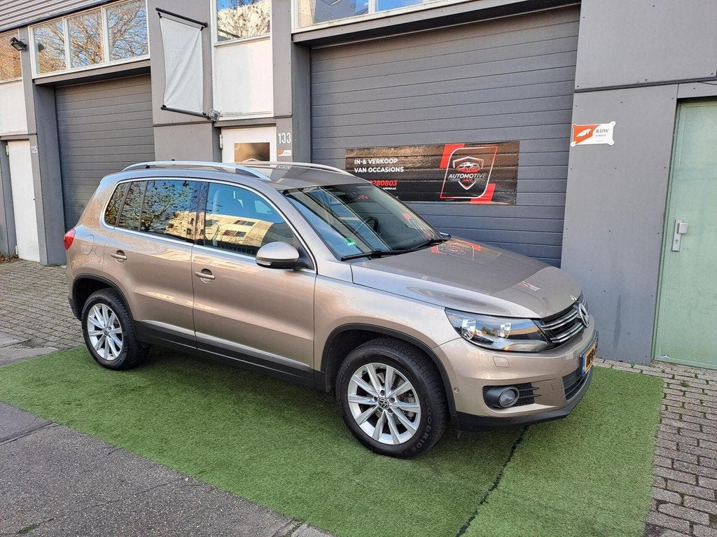 Volkswagen Tiguan 1.4 TSI Sport&Style Climate Cruise Navi, Auto's, Volkswagen, Voorwielaandrijving, Euro 5, 15 km/l, 4 cilinders