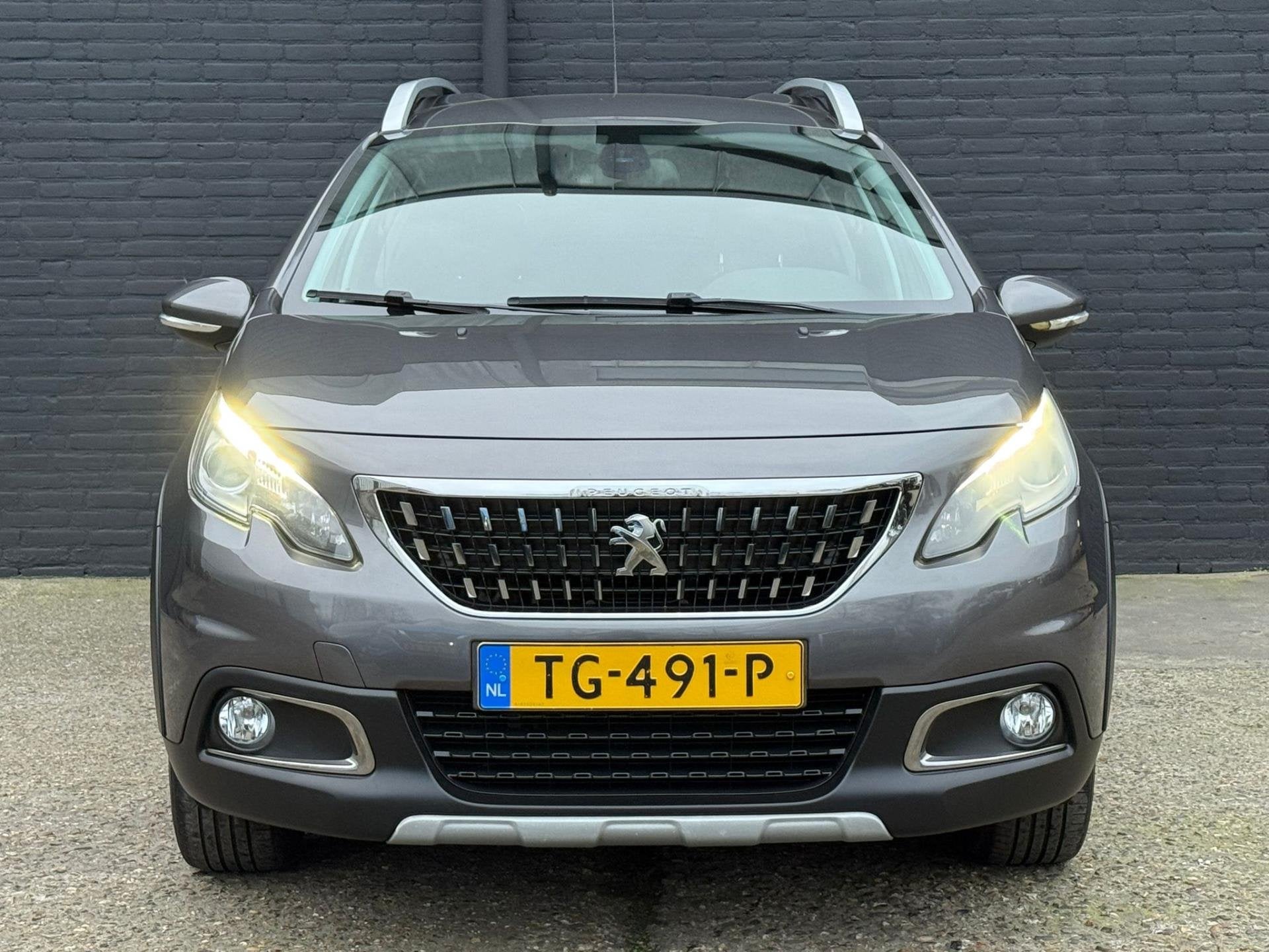 Peugeot 2008 1.2 PureTech Allure NAVI|CAMERA|PDC|CRUISE|TREK, Voorwielaandrijving, Euro 6, Leder en Stof, Origineel Nederlands