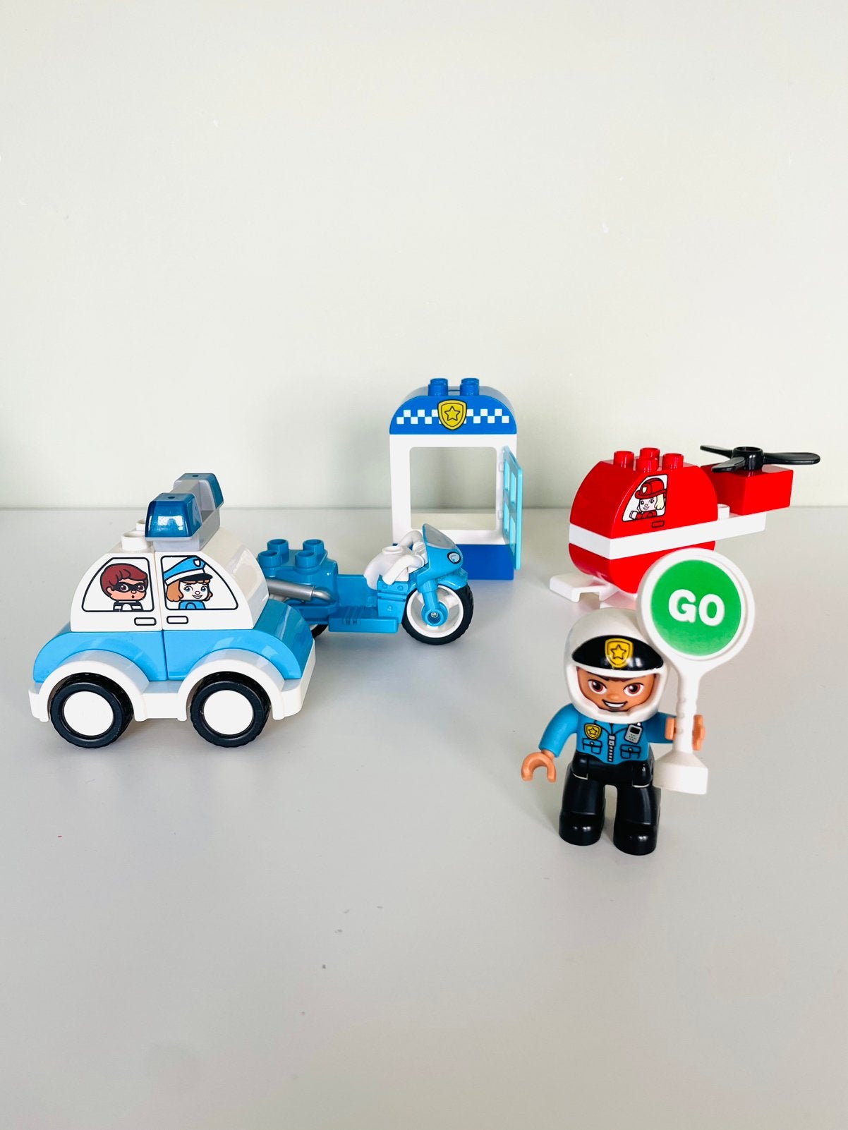 Lego Duplo | Politie set: agent, motor, auto, helikopter, Ophalen of Verzenden, Zo goed als nieuw, Compleet, Duplo