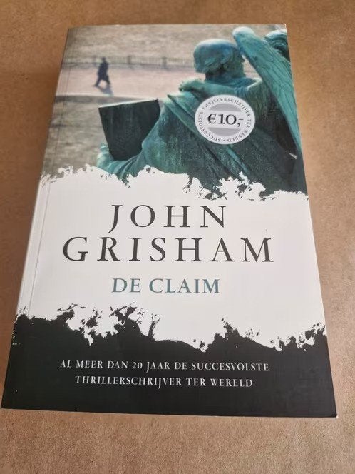 John Grisham - De claim h, Ophalen of Verzenden, Zo goed als nieuw, John Grisham, Wereld overig