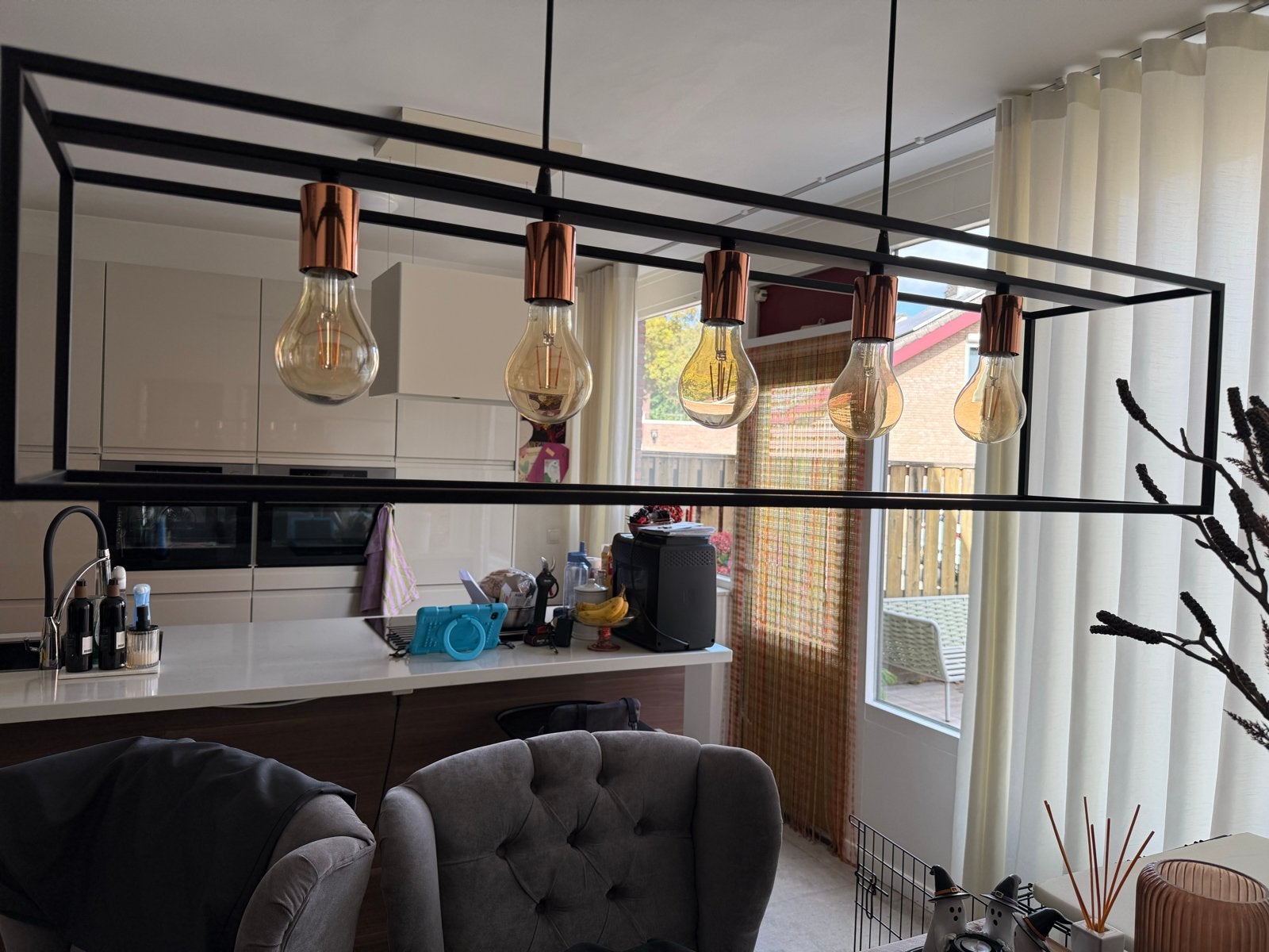 Moderne hanglamp met 5 lichtpunten en LED filament lampen