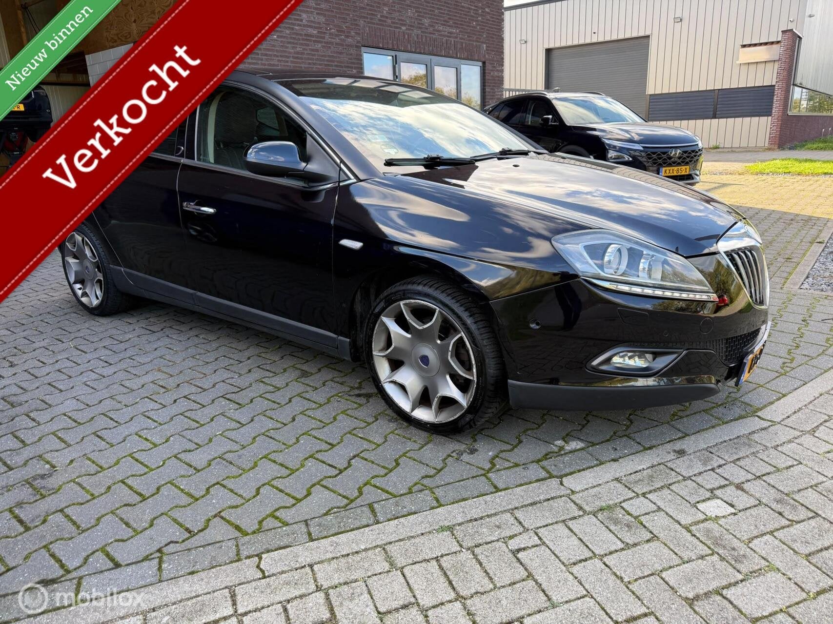 Lancia Delta 1.8-16V Di Executive, Auto's, Euro 5, Gebruikt, 4 cilinders, Zwart