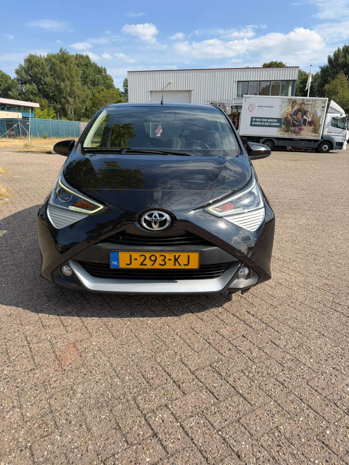 Toyota Aygo 1.0VVT-i x-joy | CarPlay |Achteruitrijcamera NAP, Auto's, Stof, Start-stop-systeem, 0 kg, Zwart