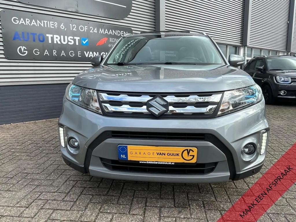 Suzuki Vitara 1.6 120PK Clima,Cruise,Panodak,Navi,Leder/Alca, Gebruikt, Zwart, 4 cilinders, Met garantie (alle)