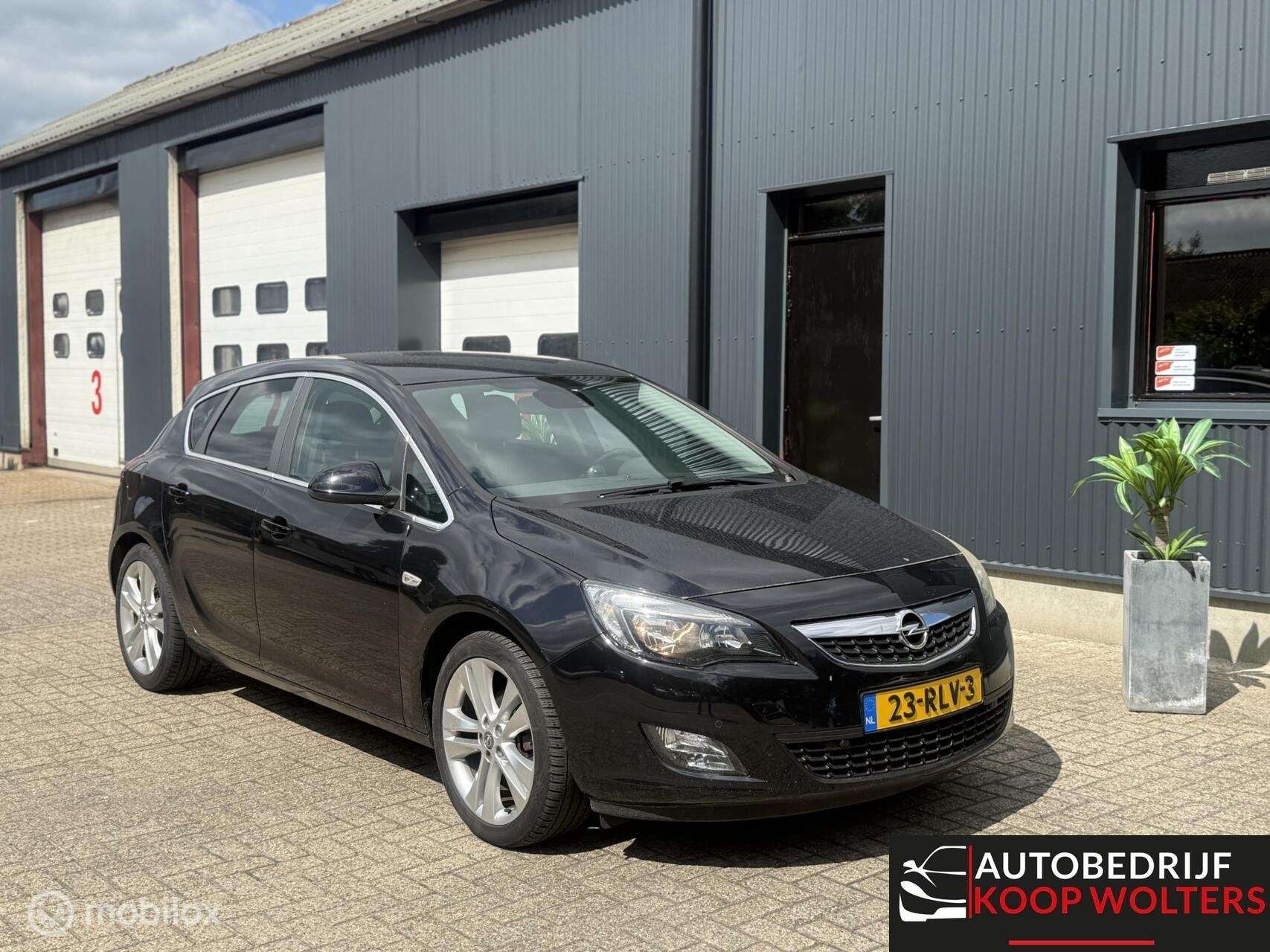 Opel Astra 1.4 Turbo GT Clima Navi Trekhaak, Auto's, Voorwielaandrijving, Euro 5, Gebruikt, 680 kg