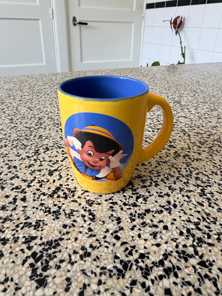 Disney Pinokkio Mok - Esso Spaaractie Disneyland Parijs, Ophalen of Verzenden, Peter Pan of Pinokkio, Zo goed als nieuw, Servies