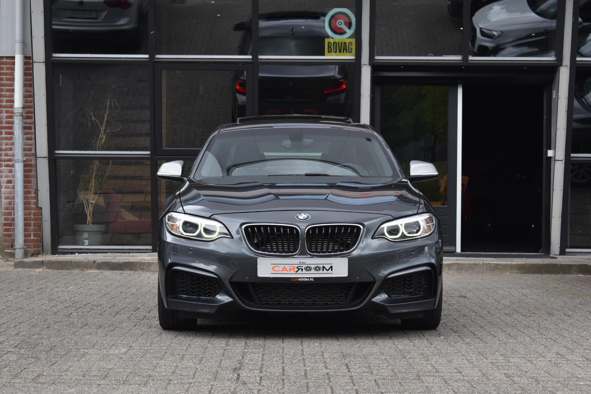 BMW 2-serie Coupé M235i High Executive Keyless Pano H/K Cam, Dealer onderhouden, Achterwielaandrijving, Gebruikt, Met garantie (alle)