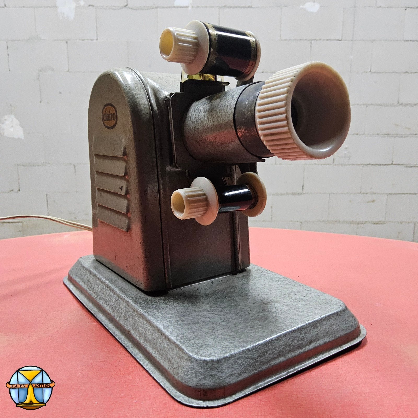 Vintage Clairo magic lantern (filmprojector) met porno film, Audio, Tv en Foto, Filmrollen, ., Ophalen of Verzenden, 35mm film