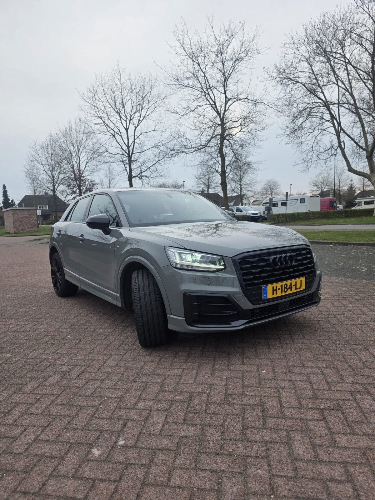 Audi Q2 35 Tfsi 150pk S Tronic 2020 Grijs, 15 km/l, 4 cilinders, Leder en Stof, Origineel Nederlands