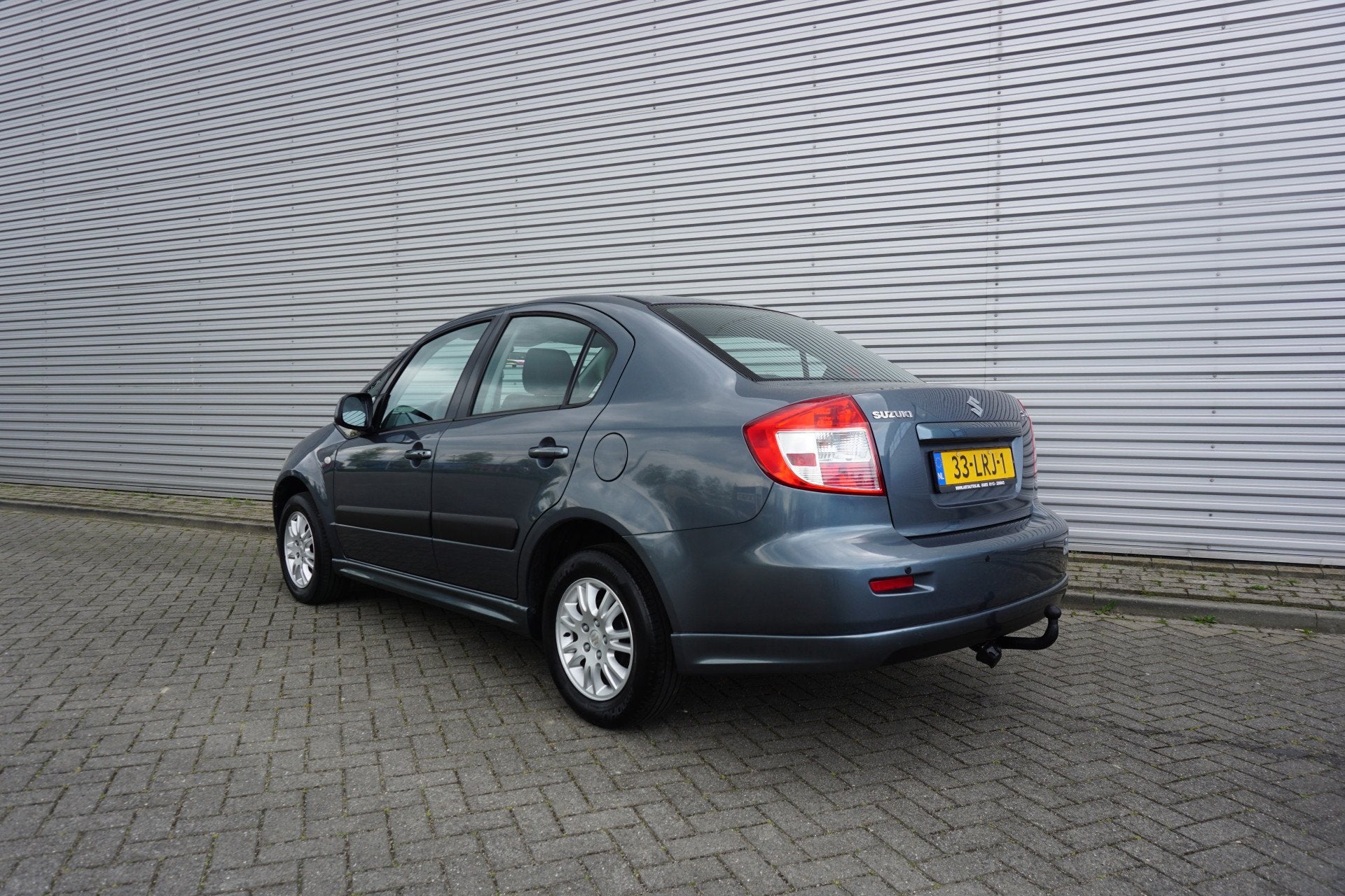 Suzuki SX4 1.6 Exclusive Airco / Elektr. ramen / Parkeersens, Auto's, Elektrische ramen, Gebruikt, 4 cilinders, 49 €/maand