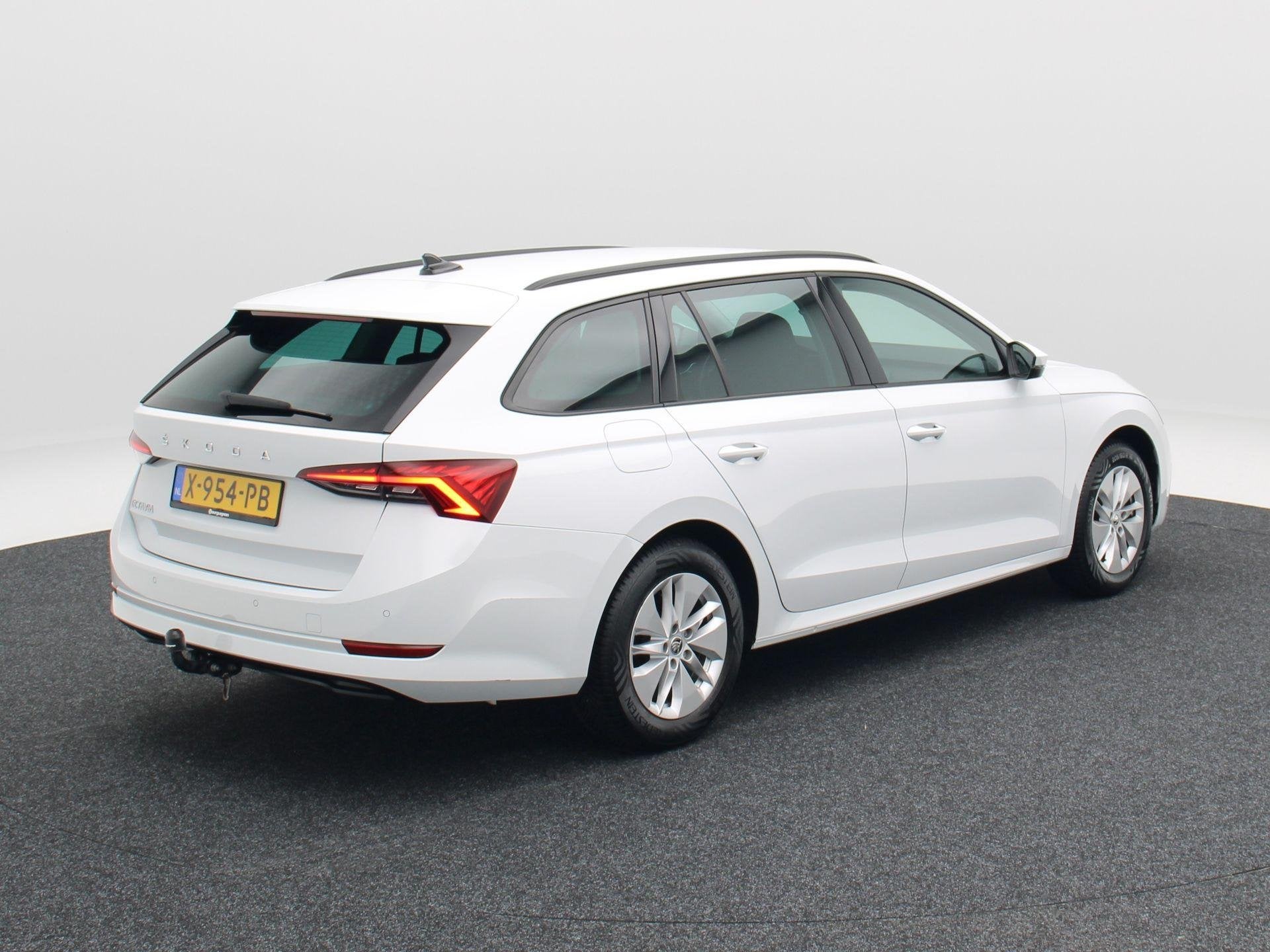 Skoda Octavia Combi 1.0 TSi 110 Pk Business Edition | Trekha, Auto's, Voorwielaandrijving, Stof, Gebruikt, Wit