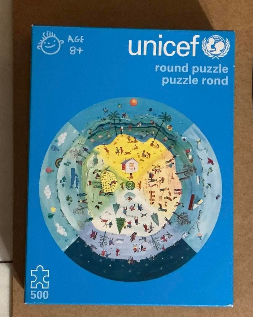 UNICEF Ronde Legpuzzel 500 Stukjes - Zo goed als nieuw, Hobby en Vrije tijd, Denksport en Puzzels, Ophalen of Verzenden, 500 t/m 1500 stukjes