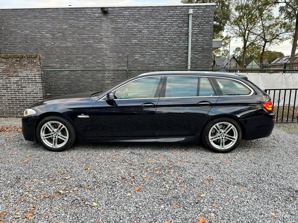 Foto 6 van BMW 5-serie Touring 520i High Executive netteauto/keurigonde