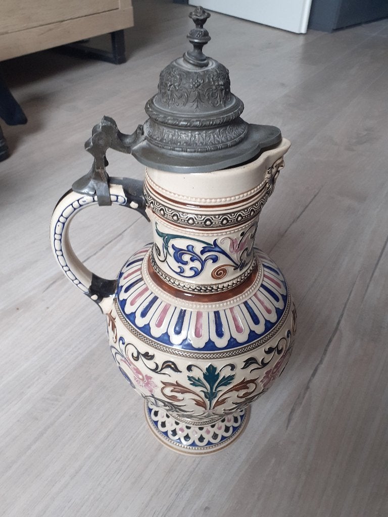Duitse wijn- of bierkruik met deksel, Ophalen