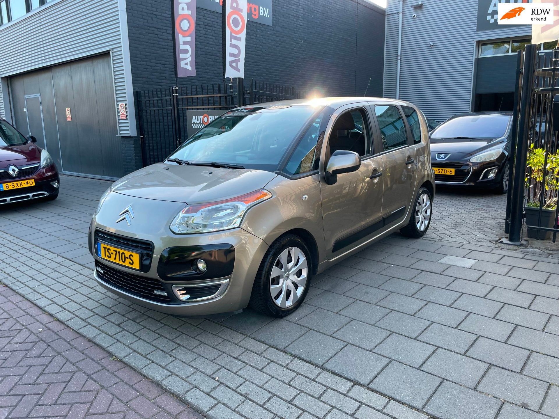Citroen C3 Picasso 1.4 VTi Exclusive Airco Navi PDC NAP APK, Auto's, Voorwielaandrijving, 15 km/l, Gebruikt, Bruin