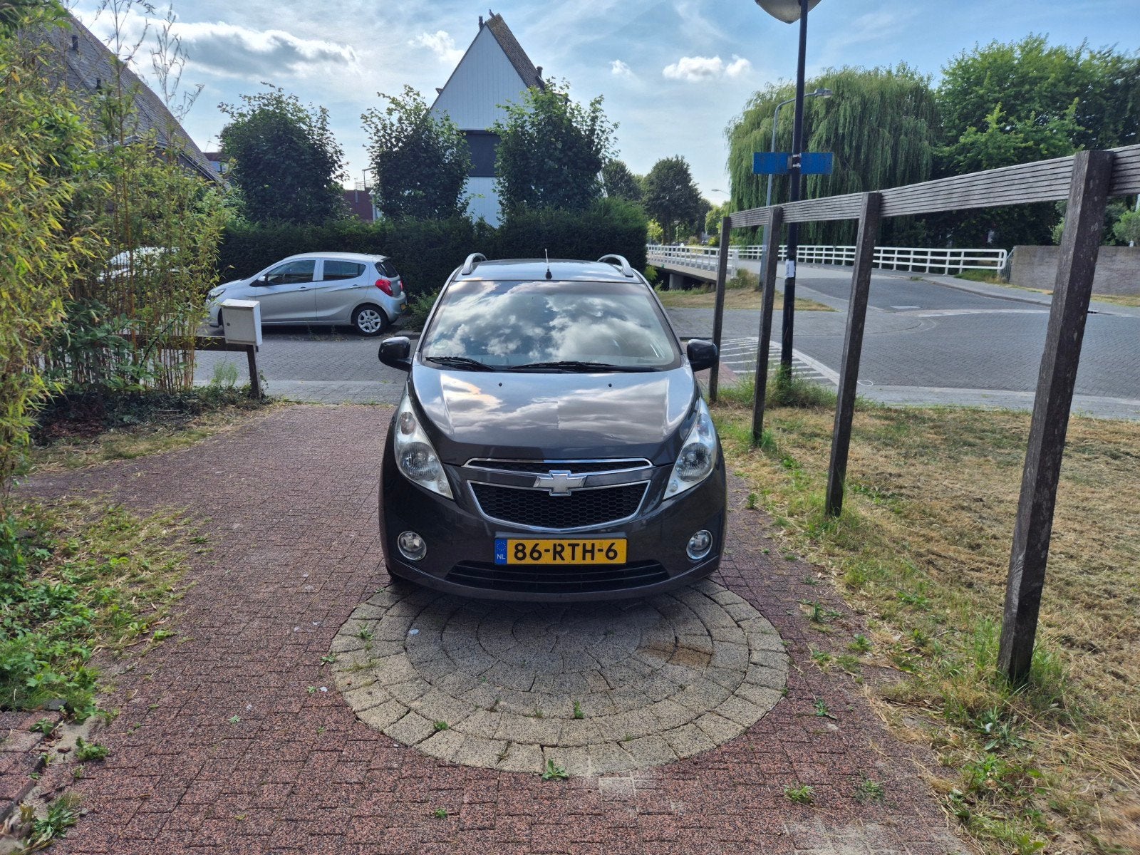 Chevrolet Spark 1.0 Bifuel 2011 - NIEUWE APK + ONDERHOUD, Auto's, Euro 5, 37 €/maand, 4 cilinders, Bruin