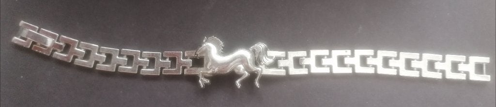 Zilverkleurige schakel armband met paard, Ophalen of Verzenden, Zo goed als nieuw, Zilver, Overige materialen