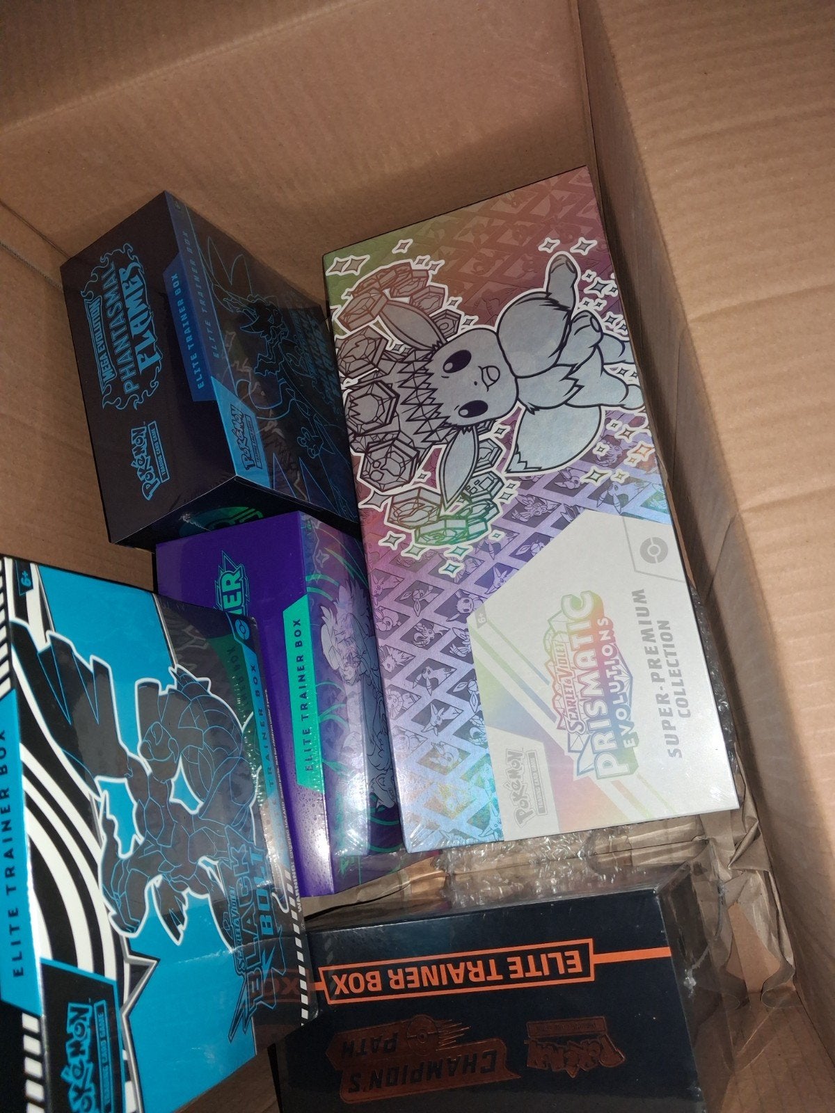 Pokémon sealed box Prismatic Evolutions SPC + black bolt etb, Ophalen of Verzenden, Nieuw, Booster, Foil