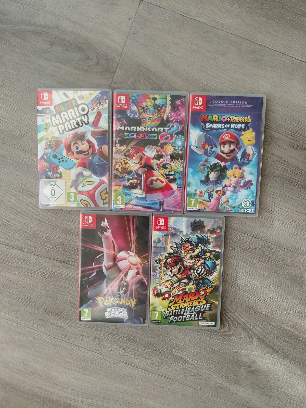 Nintendo Switch Games pakket: Mario Kart 8, Pokémon, en meer, Spelcomputers en Games, Gebruikt, Overige genres, Ophalen of Verzenden