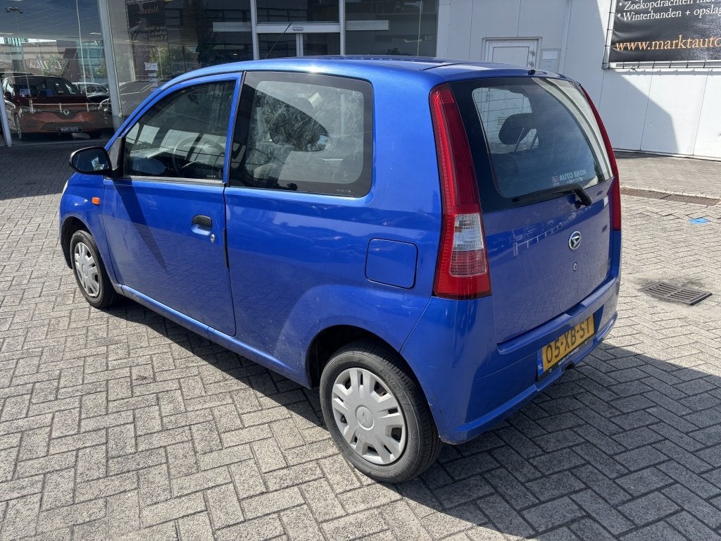 Daihatsu Cuore 1.0-12V Tokyo Geen APK (bj 2007, automaat), Auto's, Automaat, 18 €/maand, ABS, Cuore