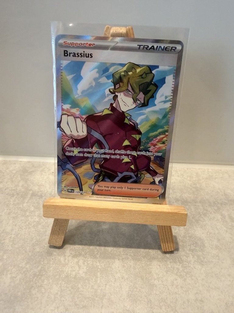 ** Prismatic Evolutions - Brassius trainer **, Ophalen of Verzenden, Zo goed als nieuw