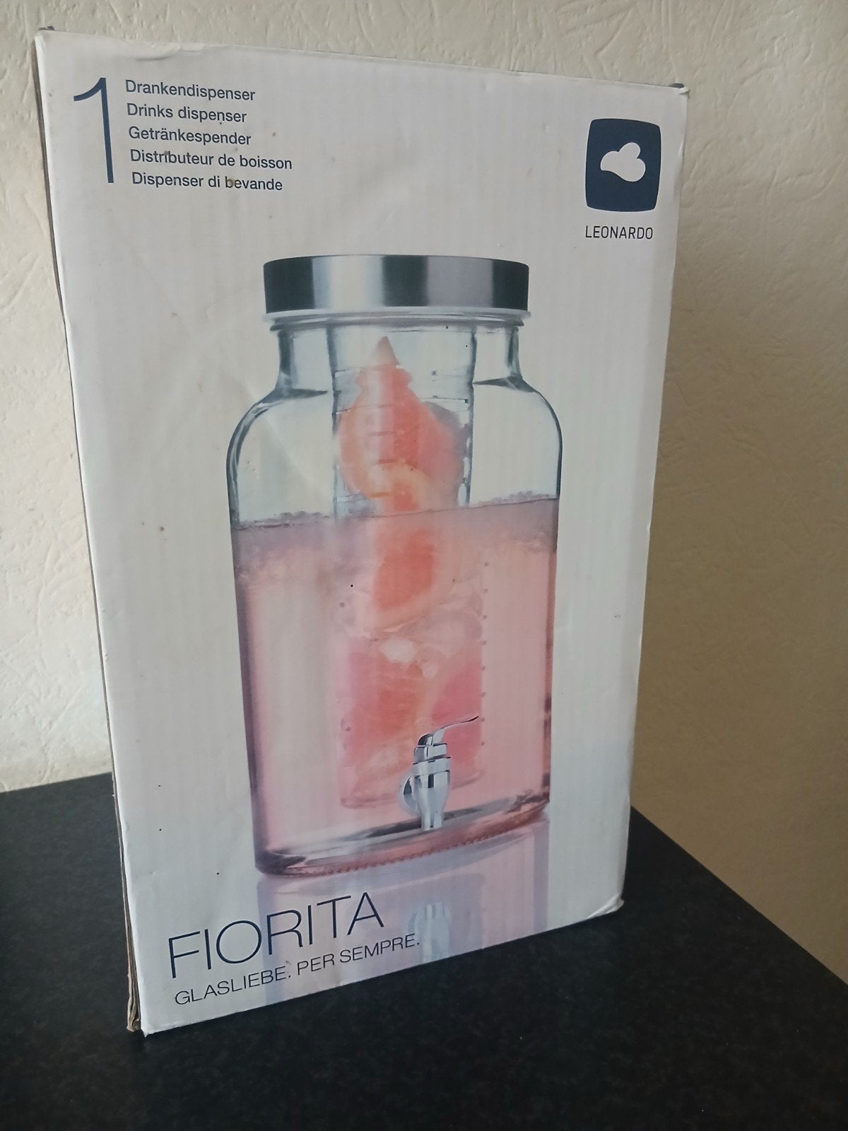 Glazen drankdispenser met tapkraan en fruitinfuser, Ophalen